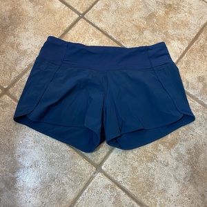LULULEMON NAVY SHORTS SIZE 6